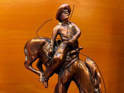 Cowboy on Horse Sculpture